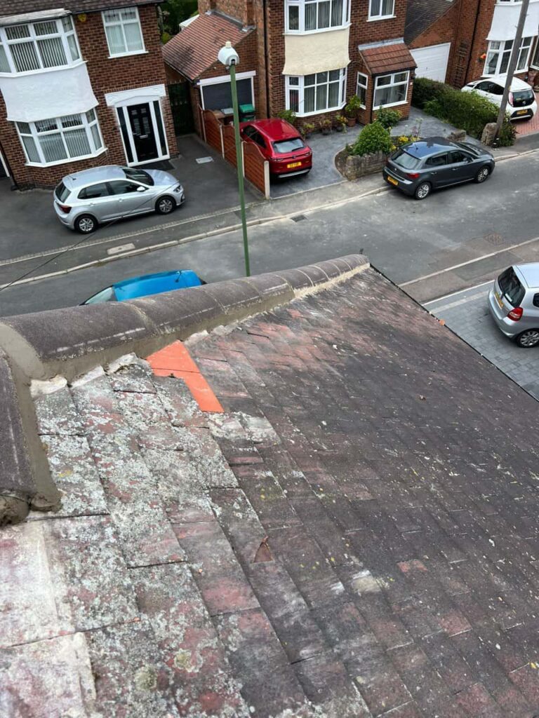 This is a photo of a hip roof where the bonnet tiles have just been replaced due to damage. Works carried out by MCM Roofing Repairs Fordingbridge
